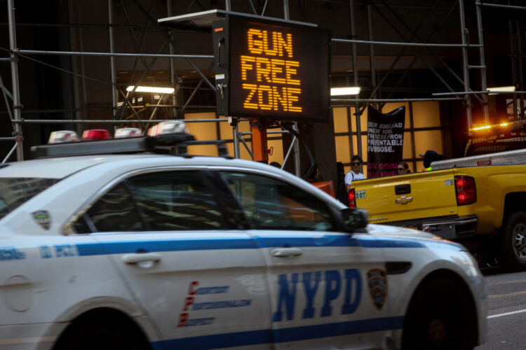 A sign similar to what is to be placed in the Times Square "gun free zone" is seen after a news conference with New York Governor Kathy Hochul and New York City Mayor Eric Adams regarding new gun laws in New York, U.S., August 31, 2022. REUTERS/Brendan McDermid